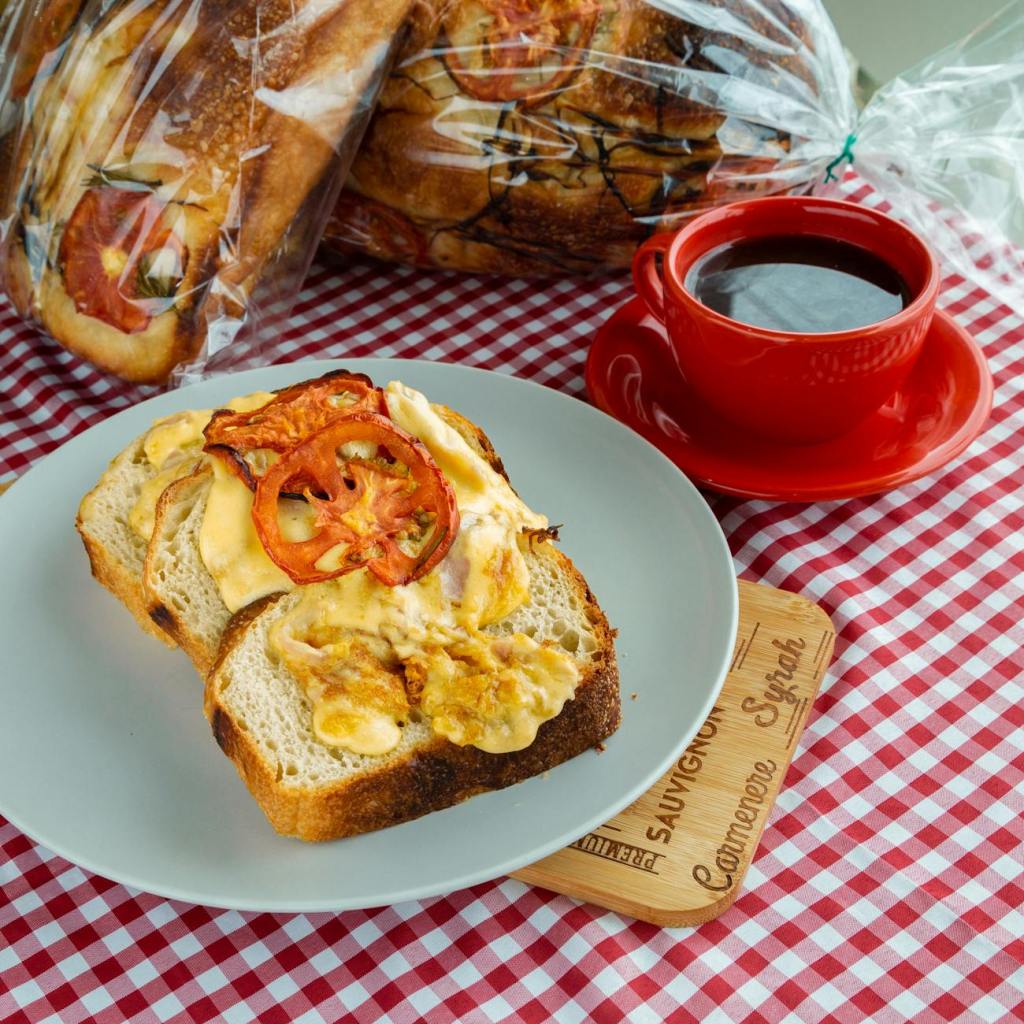 Breakfast with eggs, bread, and tomatoes, cheap to make